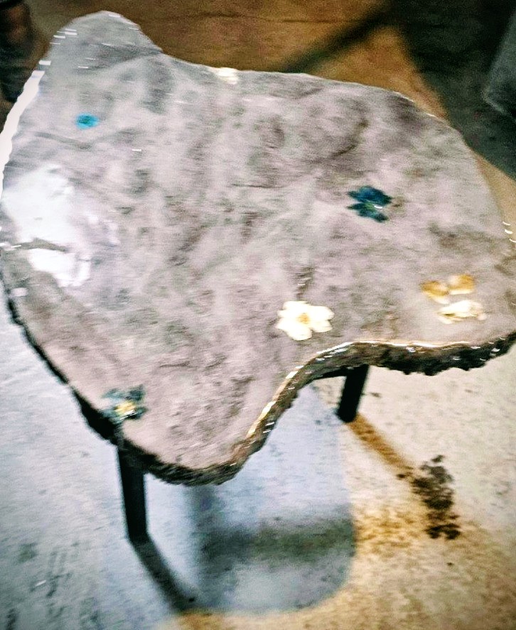 Concrete detail with flower pattern and resin