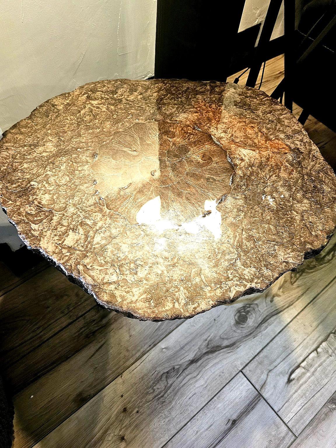 Sun concrete table with warm gold tones